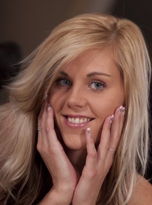 Busty tattooed European solo girl Kayla Green spreading shaved cooter